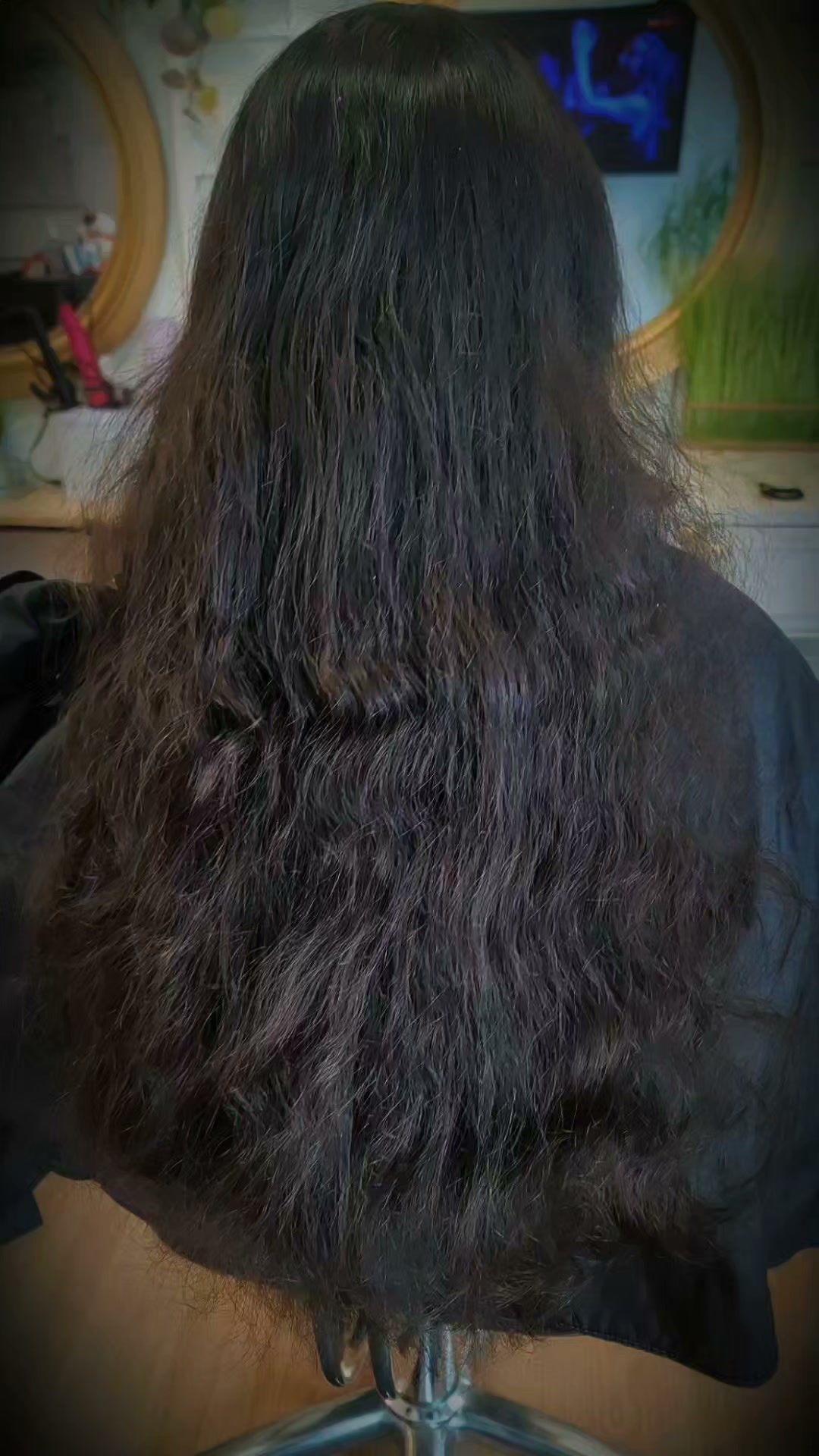 Long curly hair photographed in JasBeauty's salon
