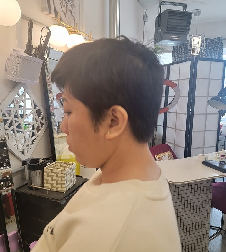 Finished short haircut shown from the side