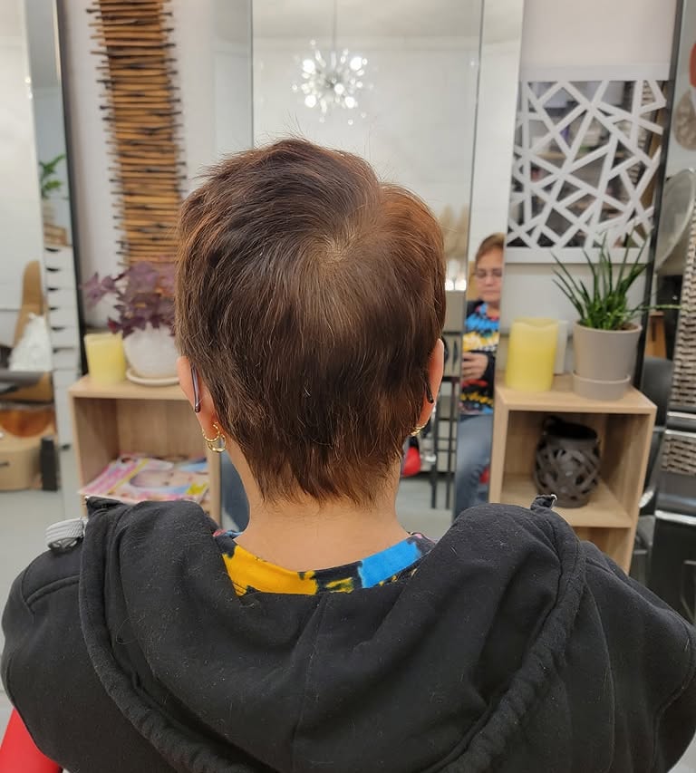 Finished short haircut photographed from the back