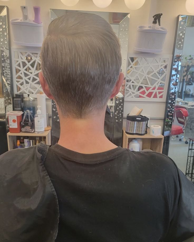 Fresh short haircut photographed from the back