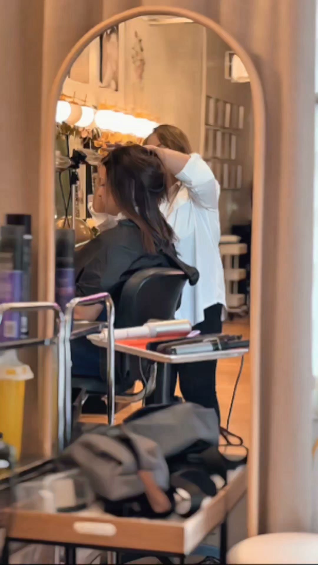 Jasmin working with a client in the JasBeauty salon